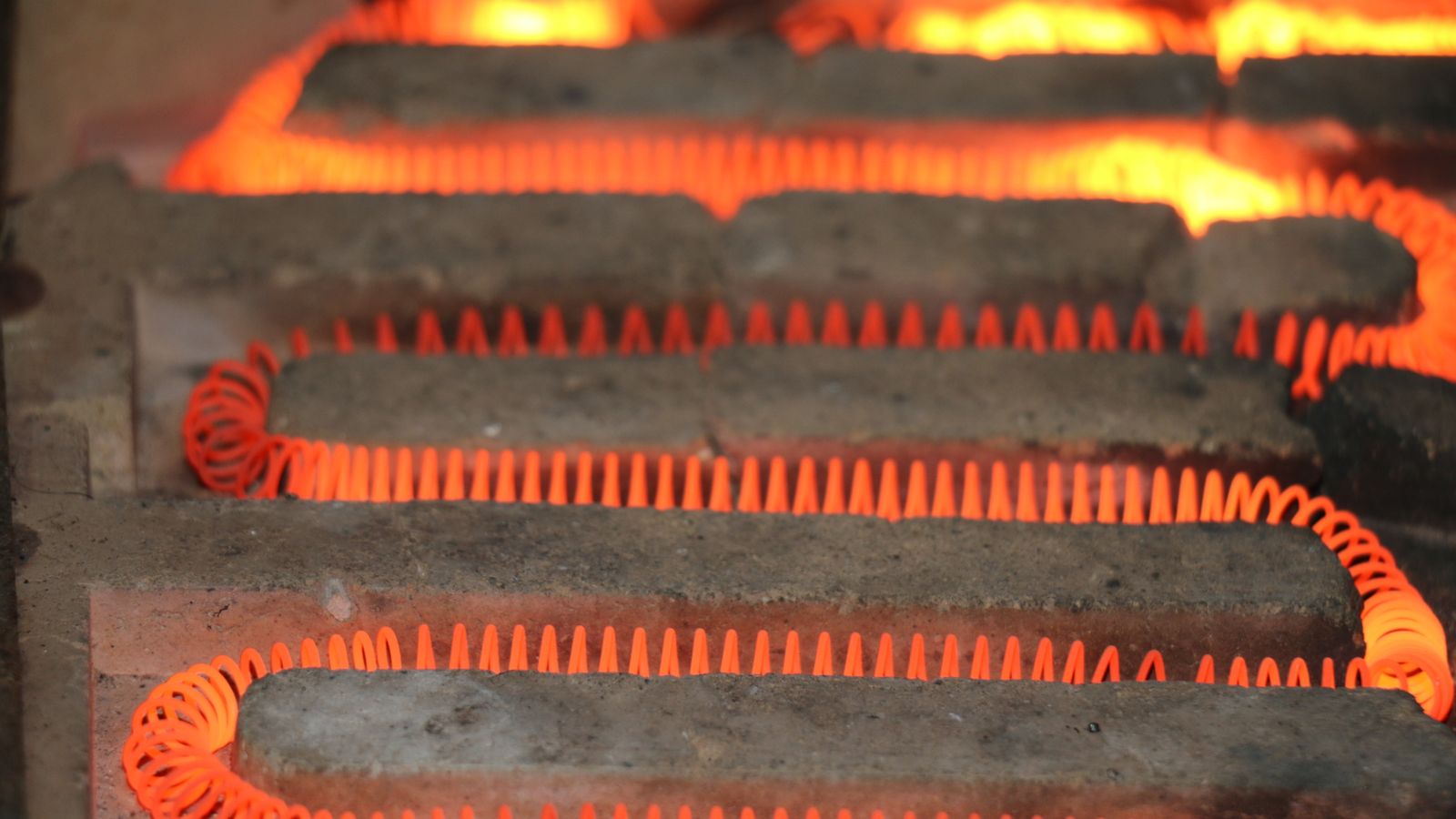Close-up of a glowing electric heating element
